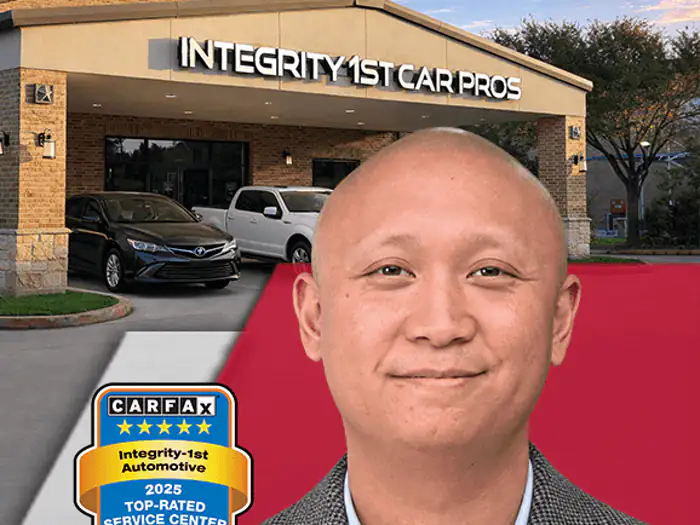 The manager of the Cinco Ranch Integrity 1st Car Pros shop, outside the building